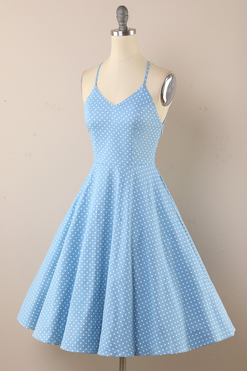 Vestido às bolinhas vintage dos anos 1950