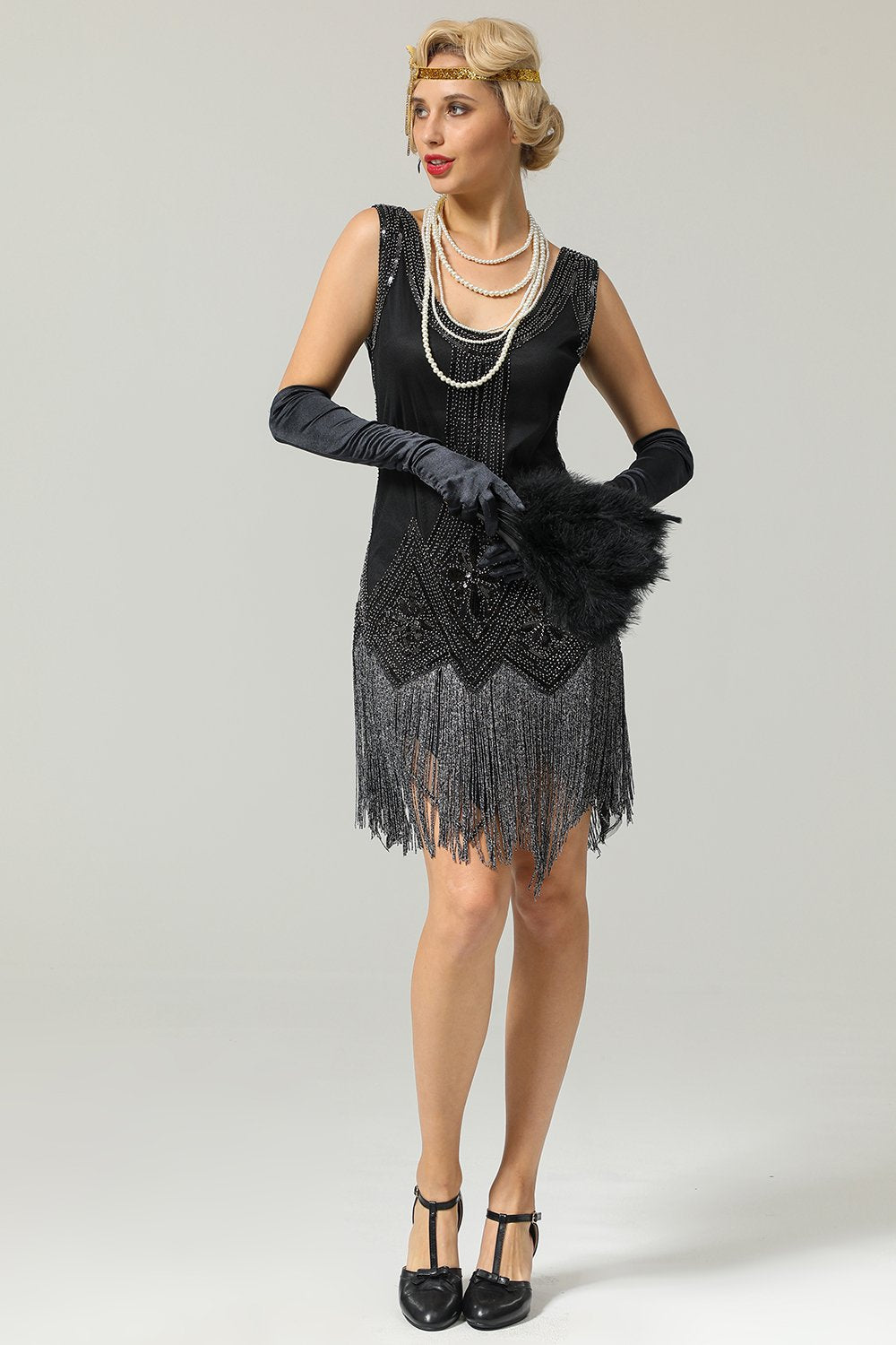 Preto vestido de flapper de lantejoulas dos anos 1920