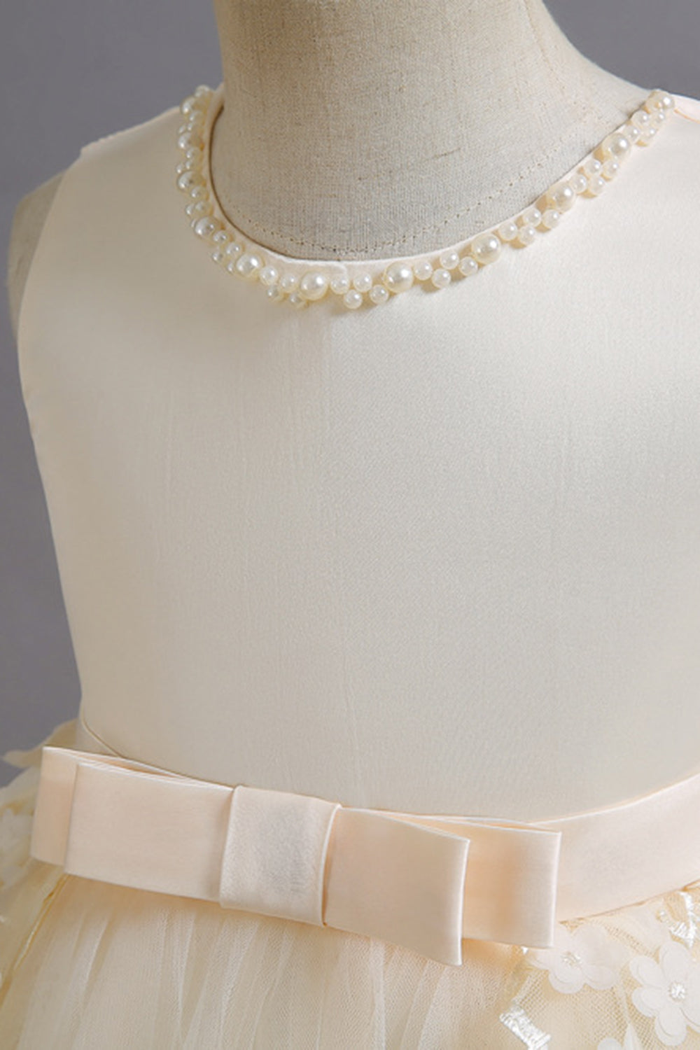 Champanhe A Line Tule Sem Mangas Vestido de Menina Com Arco