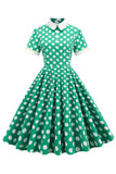 Vestido vintage verde ponto branco com mangas curtas