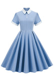 Vestido vintage azul claro dos anos 50 com mangas