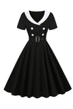 Vestido preto de balanço dos anos 50 com cinto