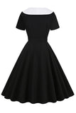 Vestido preto de balanço dos anos 50 com cinto