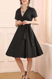Vestido preto com pontos brancos dos anos 50