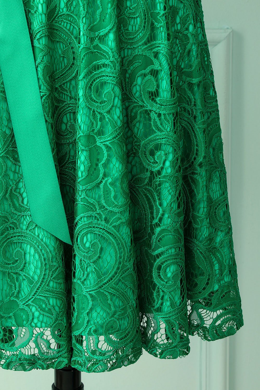 Dama de honra verde do laço