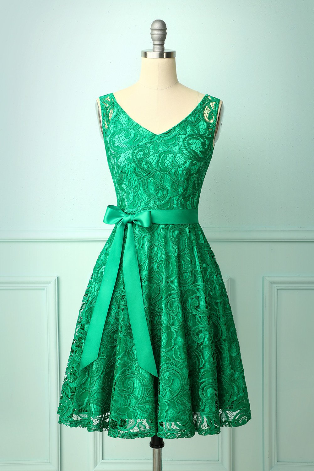 Dama de honra verde do laço