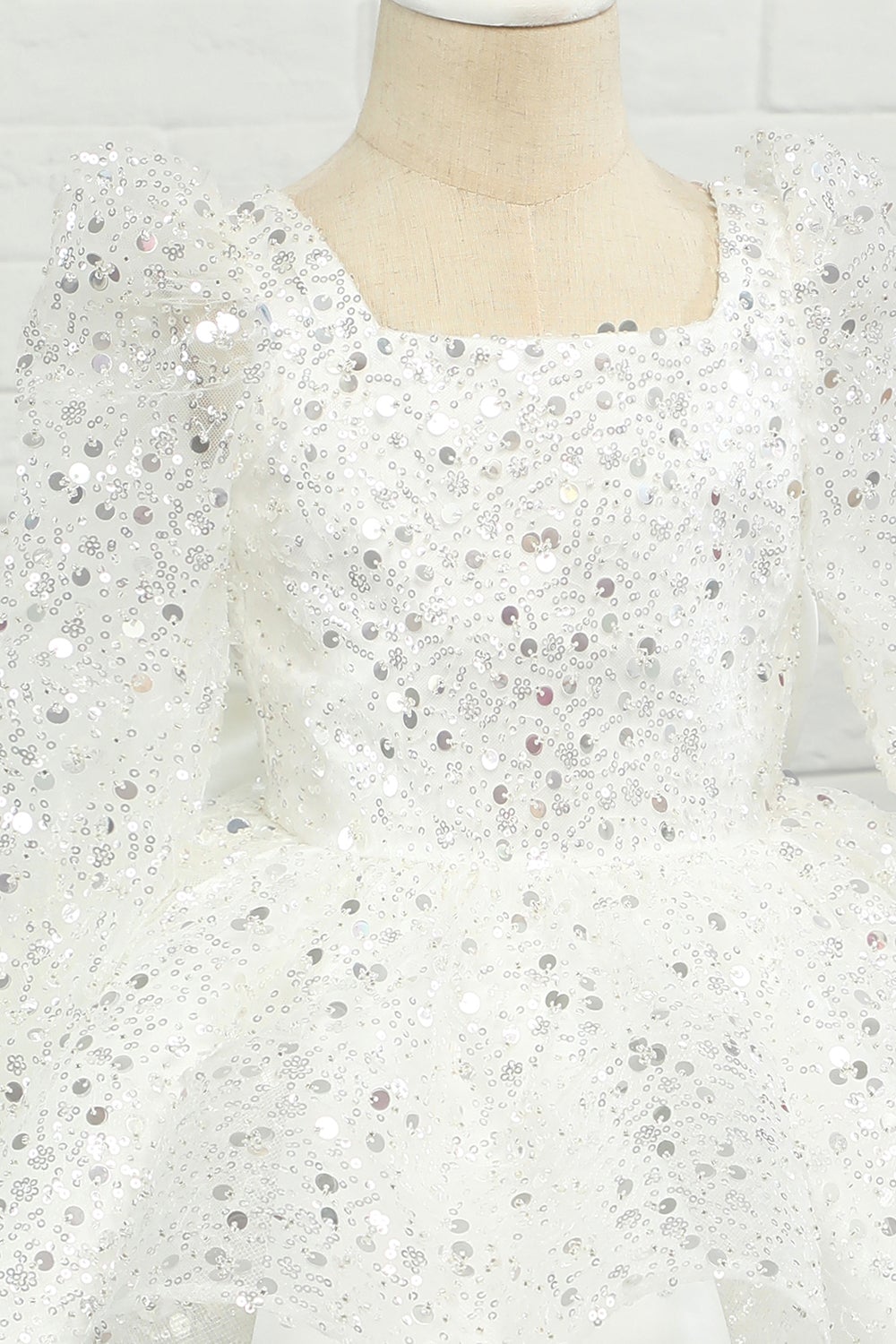 Vestido de menina flor de lantejoulas de marfim com arco