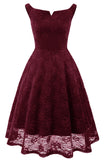 Um vestido de cocktail verde escuro bateau line
