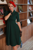 Vestido de 1950 vintage verde escuro com mangas
