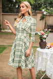 Vestido de xadrez de estilo retrô com buraco de fechadura
