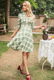 Vestido de xadrez de estilo retrô com buraco de fechadura