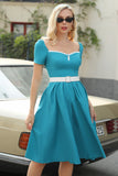 Vestido de Manga Curta Azul Pavão dos anos 50( O cinto não está incluído)