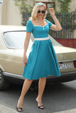 Vestido de Manga Curta Azul Pavão dos anos 50( O cinto não está incluído)