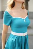 Vestido de Manga Curta Azul Pavão dos anos 50( O cinto não está incluído)