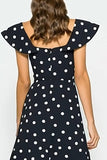 Vestido preto e branco Linha A com mangas esvoaçantes longas e bolinhas