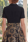 Um vestido Jacquard preto de decote em V longo com laço e laço