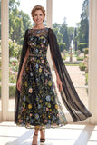 Vestido longo de mãe da noiva em tule bordado em linha A preta com mangas de capa