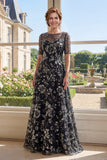 Vestido de Mãe da Noiva em tule preto com gola bata e gola batida, linha A