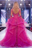Vestido longo de concurso de sereia com espartilho transparente e fúcsia brilhante