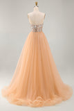 Vestido longo de concurso com espartilho transparente e sereia de champanhe brilhante