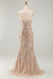 Vestido longo de concurso com espartilho transparente e sereia de champanhe brilhante