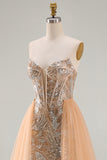 Vestido longo de concurso com espartilho transparente e sereia de champanhe brilhante