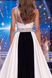 Vestido de concurso preto, branco e sereia preta, um ombro franzido, com contas e faixa