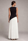 Vestido formal preto e branco, decote redondo, bainha longa, com fenda