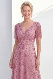 Vestido da Mãe da Noiva com decote em V em linha rosa poeirenta e franjas