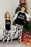Conjunto de pijamas familiares pretos de manga comprida com estampado de Natal a condizer