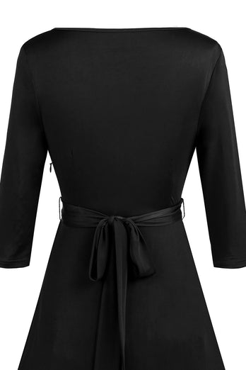 Vestido preto vintage de 1950 com faixa