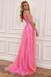 Um vestido de baile spaghetti de linha rosa