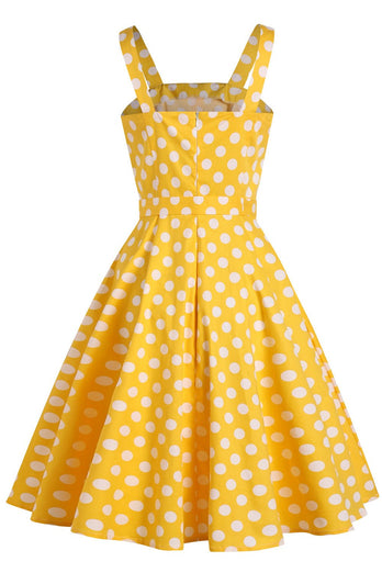 Vestido de verão amarelo às bolinhas dos anos 1950