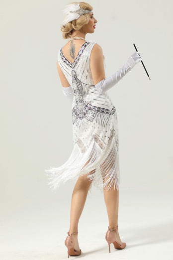 Vestido preto e dourado de lantejoulas dos anos 20