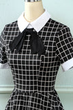 Vestido vintage xadrez de 1950 com arco