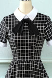 Vestido vintage xadrez de 1950 com arco