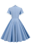 Vestido vintage azul claro dos anos 50 com mangas