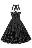 Vestido de balanço de bolinhas halter dos anos 50