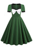 Carregar imagem no visualizador da galeria, Vestido de balanço verde escuro de 1950 com arco
