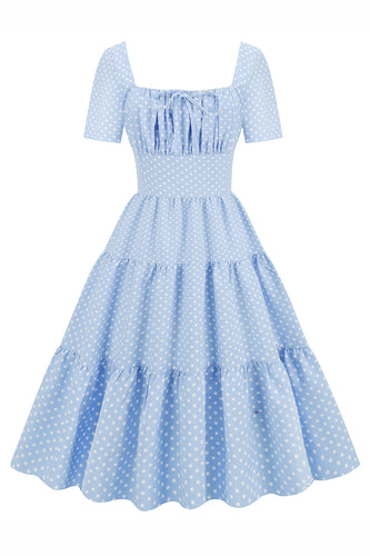 Vestido de bolinhas azuis claras swing 1950
