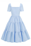 Vestido de bolinhas azuis claras swing 1950