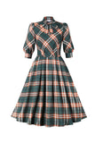 Vestido de xadrez verde escuro dos anos 50