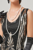Vestido preto de colher de ouro de 1920
