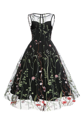 Um vestido vintage preto de joia de linha com bordado