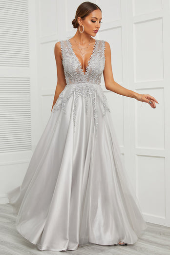 Vestido de baile longo de pescoço v profundo com apliques