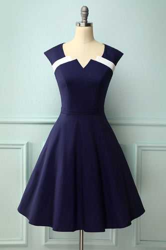 Vestido assimétrico dos anos 50 do pescoço da marinha
