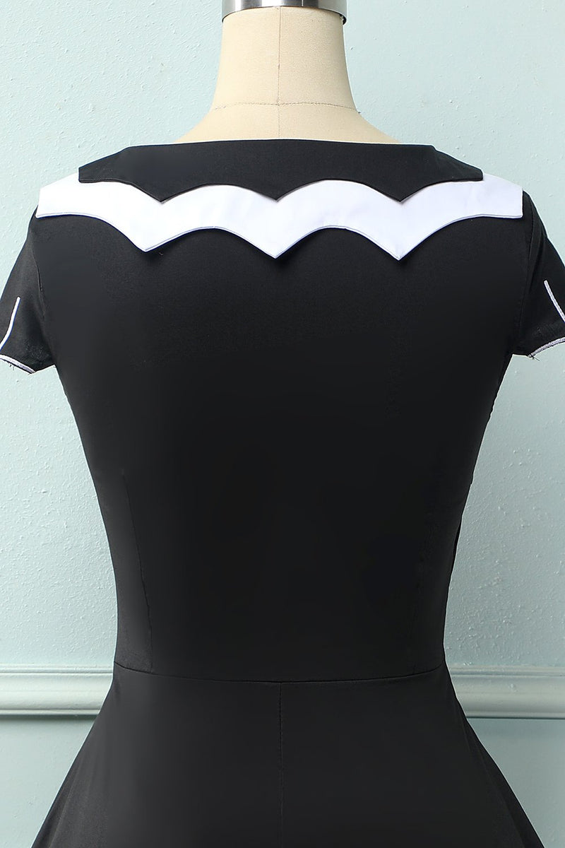 Carregar imagem no visualizador da galeria, Vestido preto de balanço de cabo de morcego dos anos 50